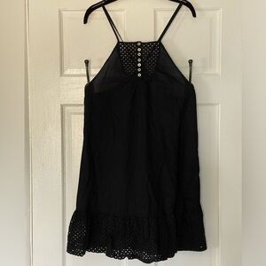 Free People Blk strap mini dress w/ Eyelet neckline & Hem and Button detail.
